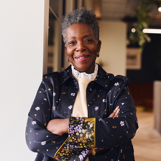 Senior woman smiling in office